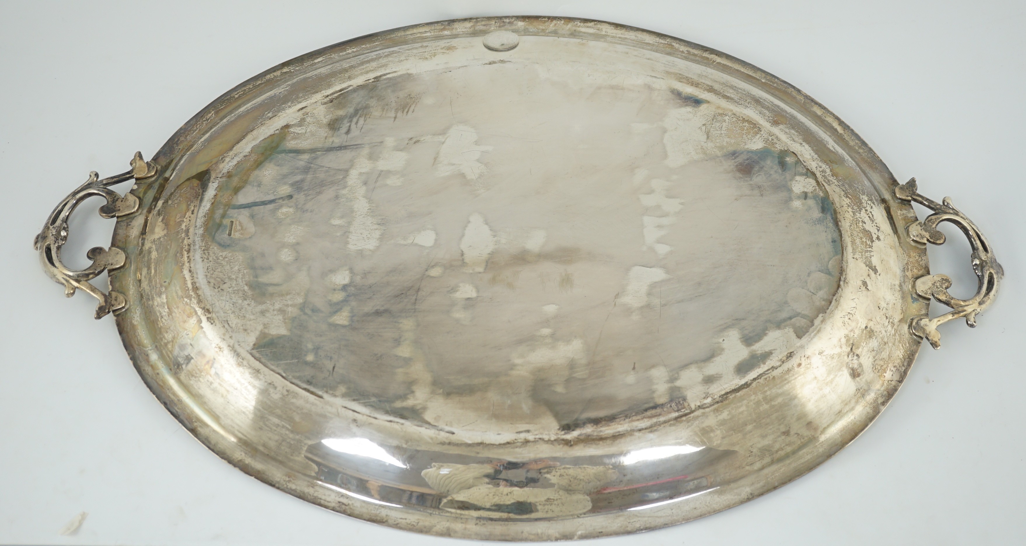 An Edwardian silver two handled oval tea tray, by Mappin & Webb